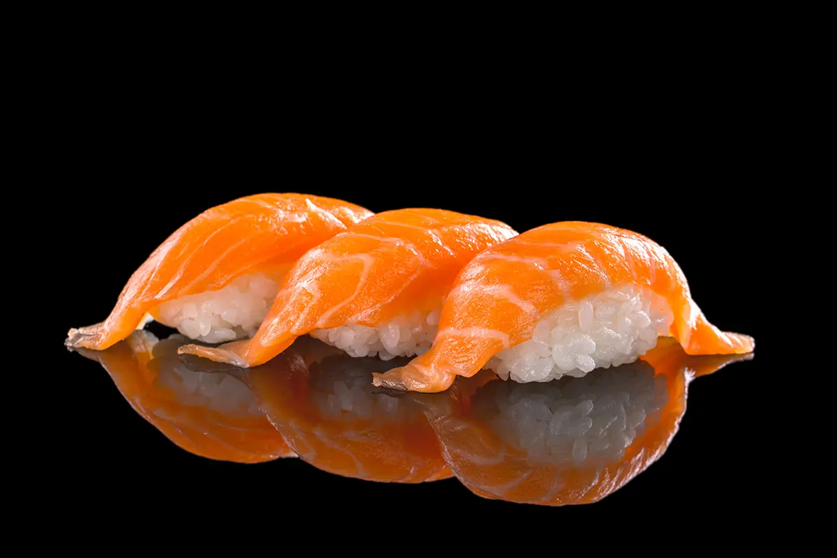 Salmon nigiri with fresh salmon atop seasoned rice at Sushi Kingdom, a Japanese Restaurant in Savannah